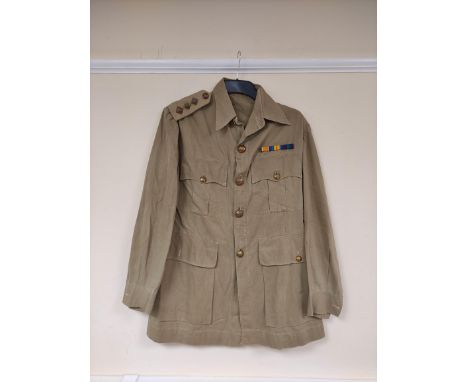 British Army uniform, a light stone summer jacket having Gaunt and Sons of London Royal Artillery brass buttons, epaulette ra