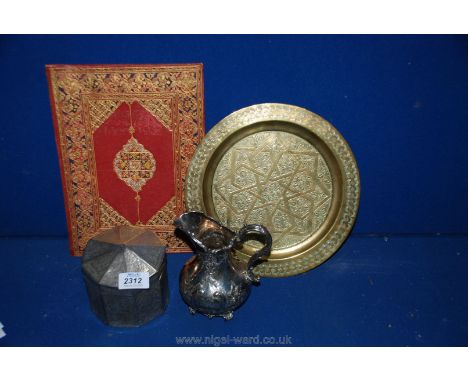 Three Persian items including a brass Persian plate, 10'' diameter, an octagonal Tea caddy in white metal, 4" x 4", and a Per