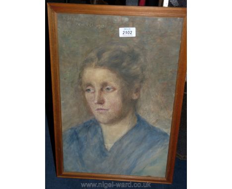 A glazed and framed watercolour portrait of a lady, signed F. Hope 1913, 17 1/4" by 11 1/4".