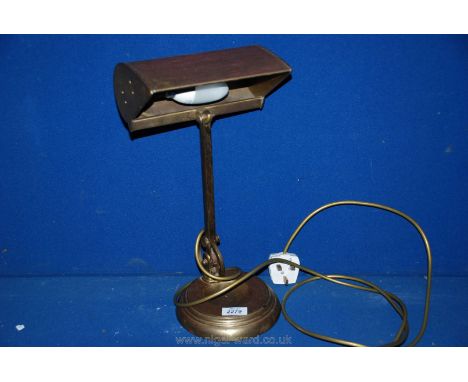 A Brass hinged Desk Lamp.