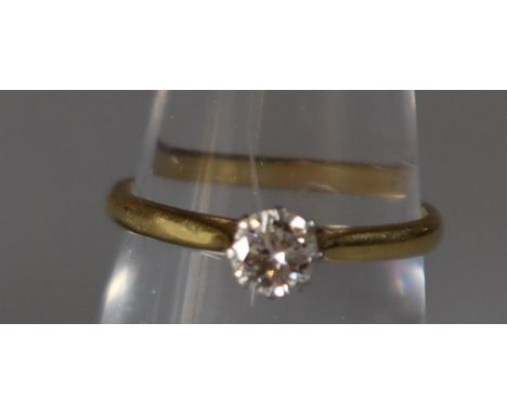 18ct gold diamond solitaire ring, 2.6g approx, ring size M. (B.P. 21% + VAT) Estimated diamond weight 0.3cts. Condition is go