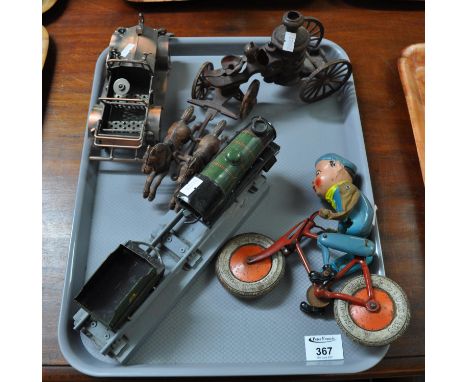 Tray with a soldered metal model car, a model Triang bike ridden by a boy scout (damaged), a model steam engine with cart and