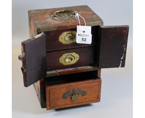 Chinese hardwood miniature table top cabinet with brass recessed handles and fitted drawers. (B.P. 21% + VAT) 