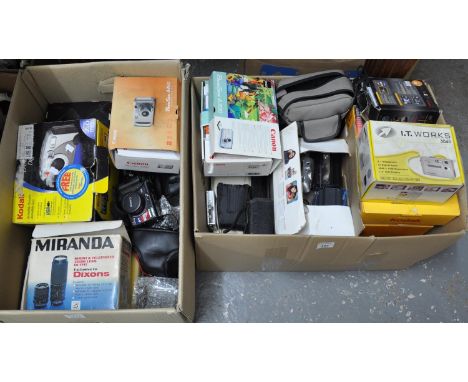 Two boxes of photographic equipment to include: two boxed Miranda lenses in good condition, a Canon Powershot A300 digital ca