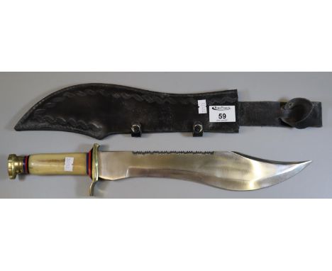 Replica bowie knife with saw back and simulated bone handle in leather scabbard. (B.P. 21% + VAT) 