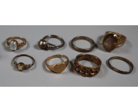 9ct gold dress ring set with a smokey quartz, two 9ct rings and assorted silver and costume rings.  Weight of 9ct gold rings 