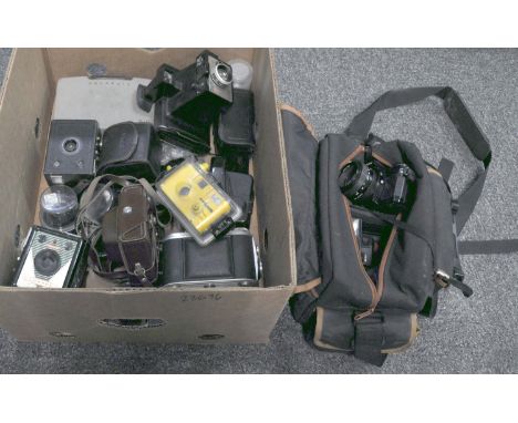 A selection of photographic equipment, various, to include: early Polaroids - the Polaroid Square Shooter 2 and Polaroid 210,