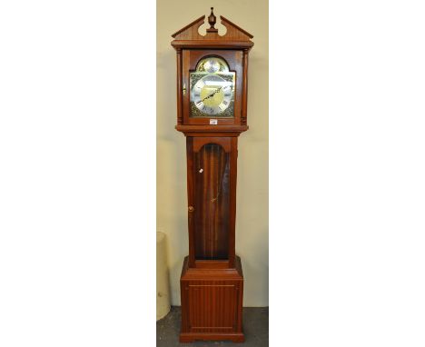 Reproduction mahogany finish longcase clock with brass and silvered dial, Roman numerals with three brass weights and pendulu