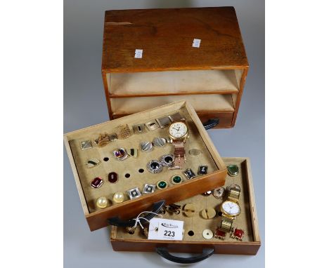 Small table top three drawer jewellery or collectors cabinet comprising two watches and various cufflinks.(B.P. 21% + VAT) 