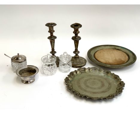 A mixed lot to include plated candlestick holders (af), jam pots, salver