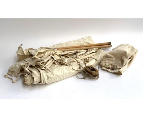 A vintage canvas tent, in original bag, with poles and line 