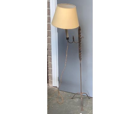 A wrought iron floorstanding adjustable rush nip candlestick,  117cmH 