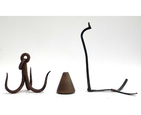 A 19th century lead dressing turnpin, 9cm high; a large iron meat hook; and one other item (3) 