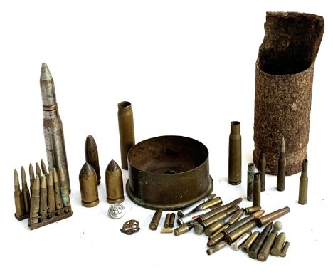 A collection of ammunition shells to include early pre-war tank piercing bullets; Japanese machine gun bullets; large shell c