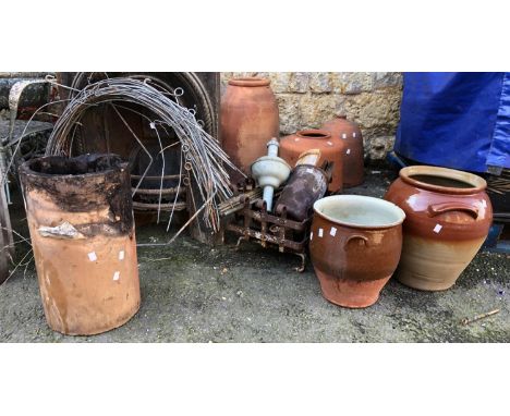 A chimney pot, two large glazed stoneware jars, fire grate, brass stair rods etc 