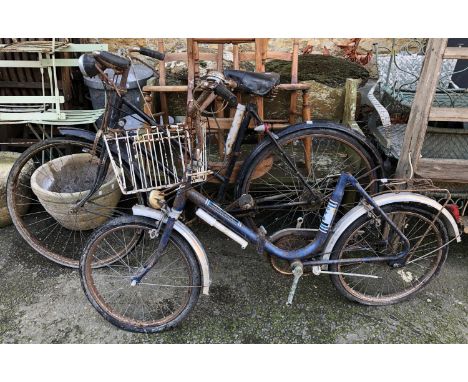 A vintage Humber bike together with a 'The Universal' vintage folding bike 