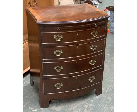 A Georgian style bowfront chest of drawers, with brushing slide over four graduating drawers, on bracket feet, 59x42x75cmH 