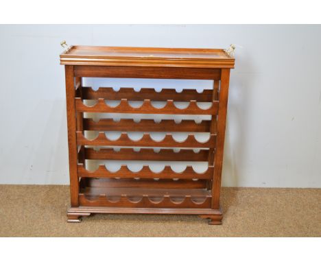 A modern mahogany wine rack, with storage for twenty-four bottles, detachable rectangular inlaid tray top with brass handles,