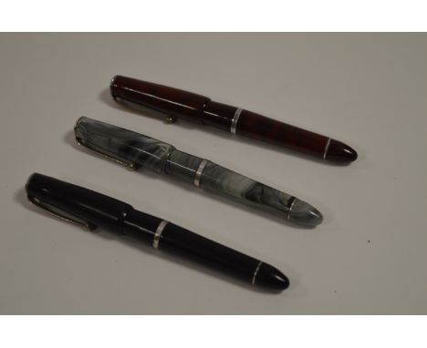 Three rare Harlin fountain pens, with button fill mechanism.