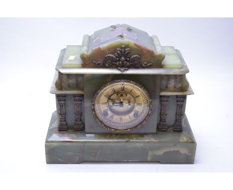 An early 20th Century architectural style onyx mantel clock, with visible Brocot escapement and Athen Clock Co. movement.
