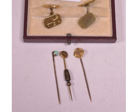 A fine pair of 9ct yellow gold cufflinks, engraved with initials, in a Garrard &amp; Co box; together with three tie pins, ea