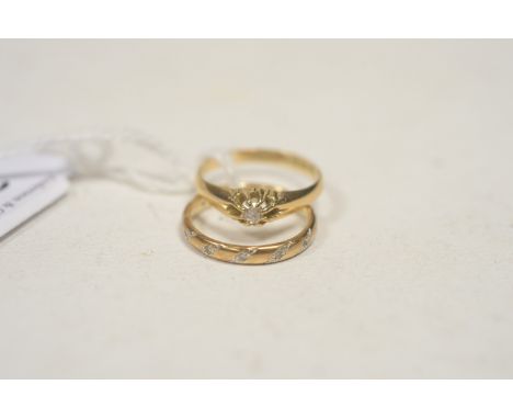 A single stone diamond ring, the old-cut diamond weighing approximately 0.15 carats, on 18ct. yellow gold shank, ring size Q;