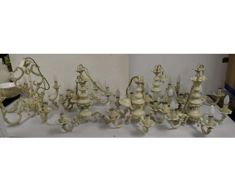 Seven white painted metal light fittings, two three-branch, four five-branch and one six-branch.