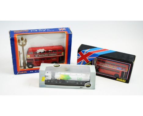 A Tomica Dandy F19 London bus; a Solido double-decker London bus; and an Oxford Haulage Scania BP tanker, all boxed. (3)