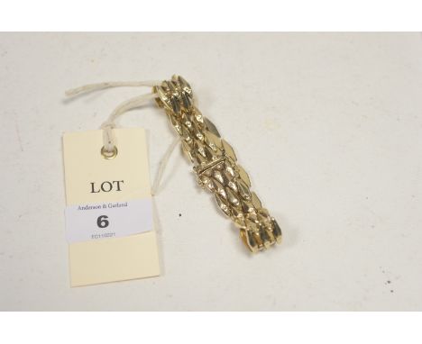 A 20th Century 9ct. yellow gold gate link bracelet of lozenge-shaped links, 18.5cms long, 21.1g.