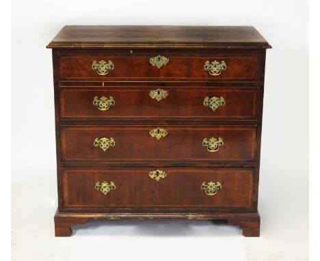 A George III walnut chest of drawers, the moulded rectangular top above an arrangement of four long drawers, raised on shaped