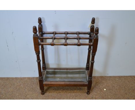 An Edwardian walnut stick stand, 48 x 23 x 70cms high.
