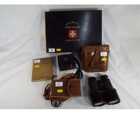 A good lot to include a vintage Harmsworth's Home Doctor vintage first aid  kit, a pair of vintage binoculars in a leather ca