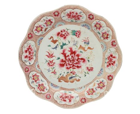CHINESE FAMILLE ROSE DISH. CHINESE FAMILLE ROSE DISH. A large Qianlong period dish of lobbed form, painted with sprays of flo