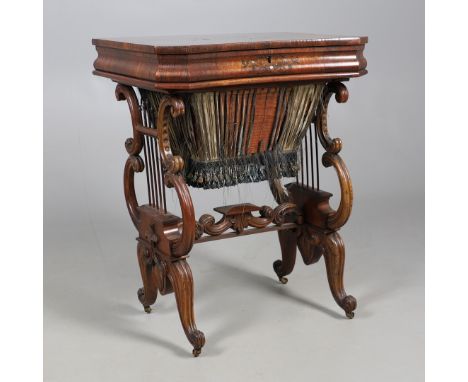 A 19TH CENTURY ROSEWOOD SEWING TABLE AND CONTENTS. A 19TH CENTURY ROSEWOOD SEWING TABLE AND CONTENTS. the concave hinged top 