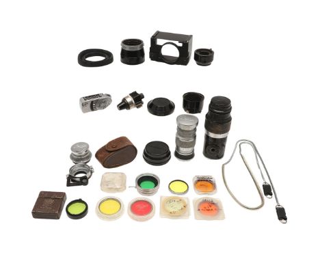LEICA CAMERA LENSES & ACCESSORIES. LEICA CAMERA LENSES & ACCESSORIES. A mixed lot including Leica lenses, they include a Leit