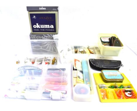 TWO 'DAIWA REGAL PLUS' SPINNING REELS boxed and an 'Okuma' river fishing reels, boxed, together with a mixed selection of lur