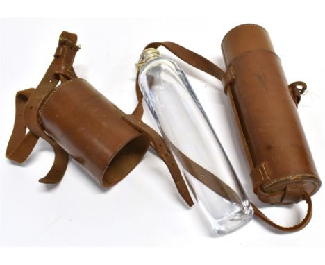 A GLASS FLASK  with plated top in brown leather holder with shoulder strap, holder 28.5cm