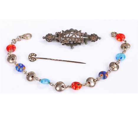 Silver jewellery, to include a bracelet with glass beads, a stick pin and a Mizpah brooch, (3)