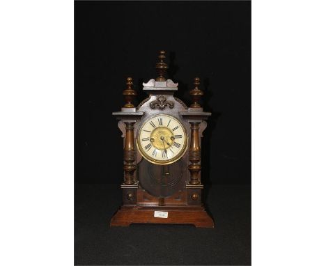 Wooden mantle clock by H.A.C. Wurttemberg