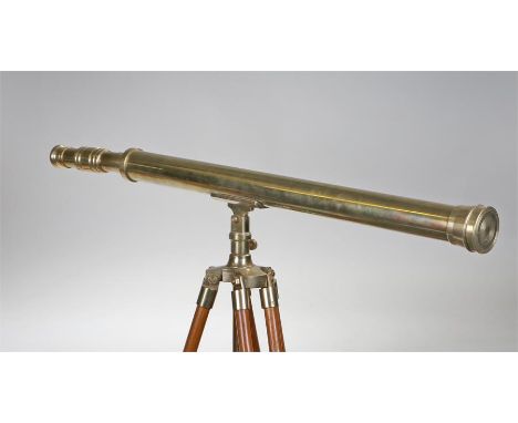 Brass telescope, the brass telescope cylinder raised above the folding stand