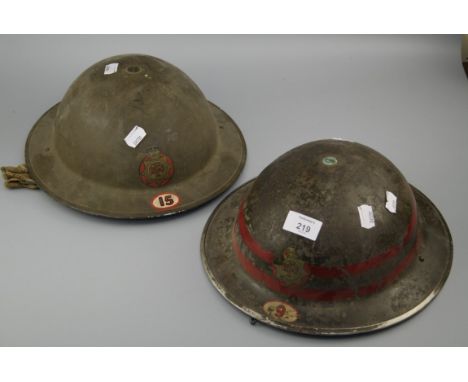 A WW2 National Fire Service helmet bearing the location numbers Leicester and the other Taplow