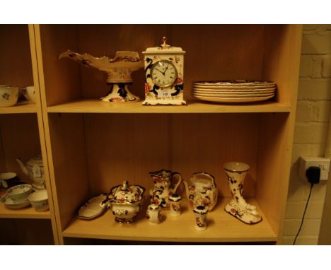 A collection of Masons Ironstone 'Mandalay' items, including, clock, comport, 6 plates, teapot, jug, cruet, sauce tureen and 