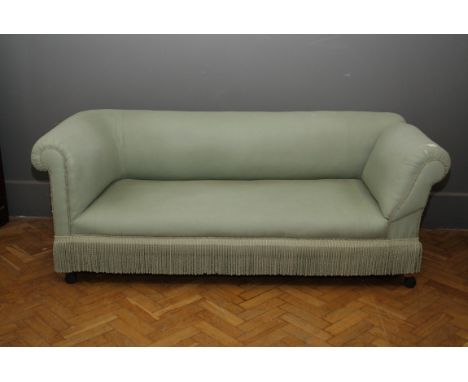 An Edwardian three seat drop arm 'Chesterfield' type sofa, with celadon green upholstery, 200cm wide