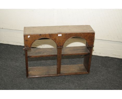 An oak 18th century arcaded wall shelf, with plain pilasters, 81cm wide