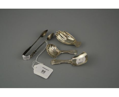 George Unite, a Victorian silver caddy spoon, fiddle thread and shell pattern, Birmingham 1886, a George III silver caddy spo