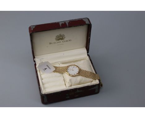 Beuche Girod. A gentleman's 9ct gold wristwatch, the circular white enamel dial with Roman numerals, date adjust at three o'c