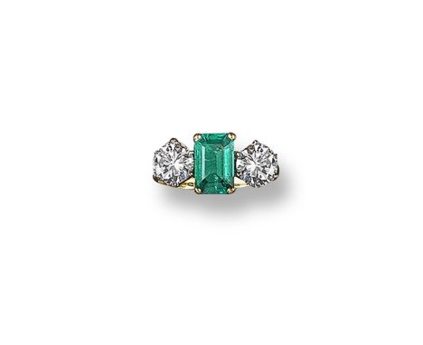 An emerald and diamond three stone ring, the emerald-cut emerald is set within two circular-cut diamonds which weigh approxim