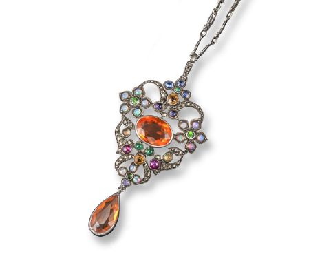 An Arts and Crafts gem-set silver pendant, of foliate design and set with an oval-shaped fire opal within a surround of furth