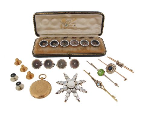 A cased set of circular shell disc cufflinks, with guilloche engraved decoration and each centred with a seed pearl within wh