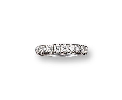 A diamond full circle eternity ring, set with circular-cut diamonds in platinum. Size Q.